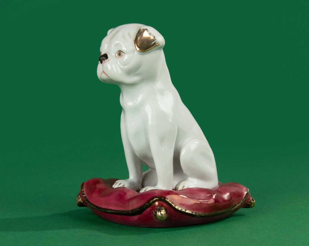 Porcelain Figurine of a Sitting Dog